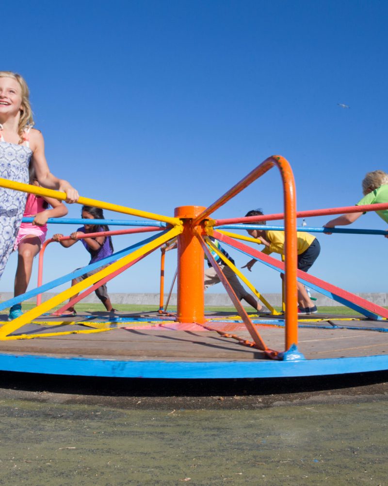 smiling-children-riding-a-carousel-in-a-park-2025-10-17-00-03-57-utc